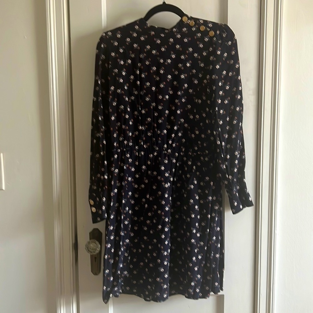 Petite navy high collar dress with floral print and button detail. Long sleeves